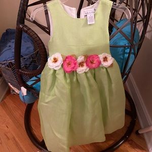 green formal child’s dress by Polly & Friends